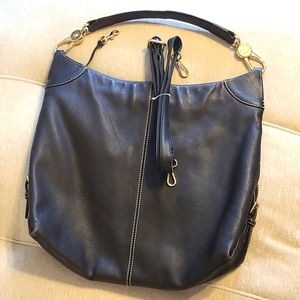 Dooney and Bourke shoulder bag with crossbody strap and wallet clip